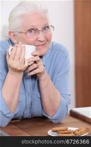 grandmother having coffee