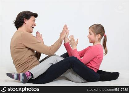 Grandmother playing with granddaughter