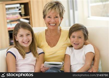 Grandmother reading with grandchildren.