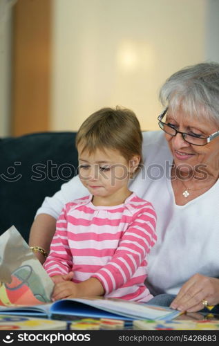 grandmother taking care of her granddaughter