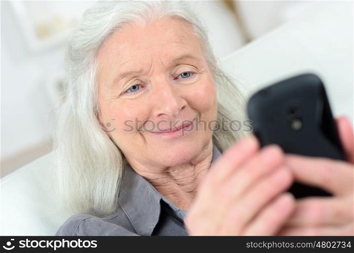 grandmother talking on mobile phone