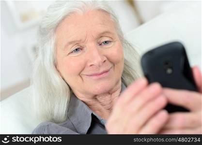 grandmother talking on mobile phone