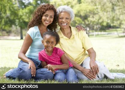Grandmother With Daughter And Granddaughter In Park