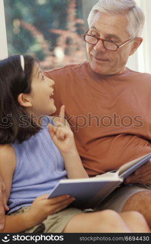 Grandpa Reading with Granddaughter