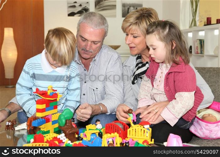 Grandparents and grandchildren playing