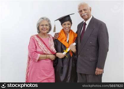 Grandparents at granddaughter&rsquo;s graduation ceremony