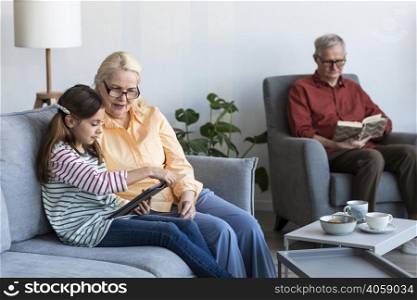grandparents girl with laptop inside
