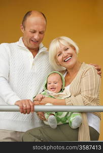 Grandparents with his grandchild