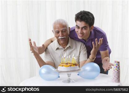 Grandson celebrating grandfather&rsquo;s birthday