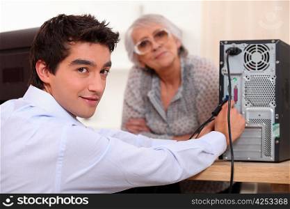 Grandson setting up computer
