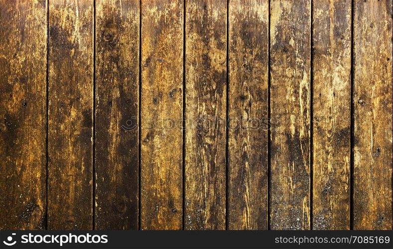 Grange Wooden slat fence with parallel planks background.. Wood panel wall texture grunge