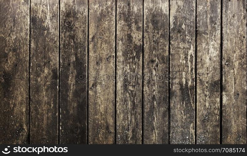 Grange Wooden slat fence with parallel planks background.. Wood panel wall texture grunge