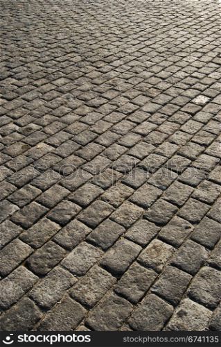 Granite grey town pavement close-up