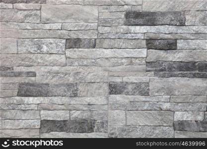Granite stone gray decorative brick wall seamless background