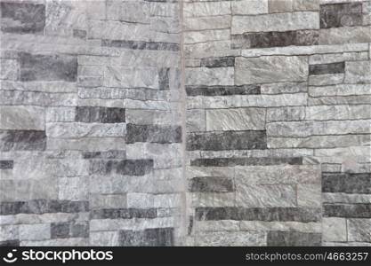 Granite stone gray decorative brick wall seamless background