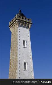 Granitic lighthouse in the harbour of Roscoff in Brittany