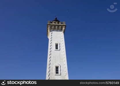 Granitic lighthouse in the harbour of Roscoff in Brittany