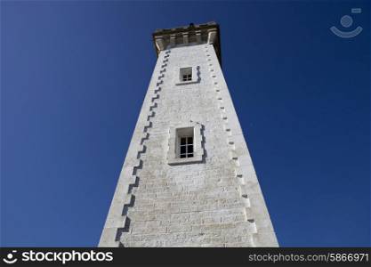 Granitic lighthouse in the harbour of Roscoff in Brittany