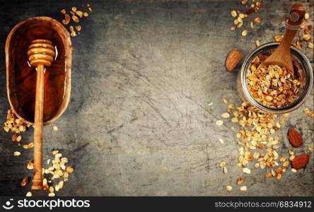 Granola and honey. Healthy eating concept. Copy space background, top view flat lay overhead