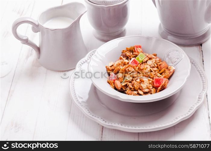 Granola and milk on the tray, for breafast