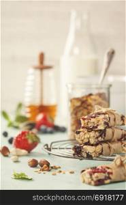 Granola bar on a blue rustic table. Healthy energy snack