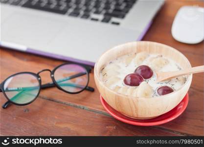 Granola with fruits on work station, stock photo
