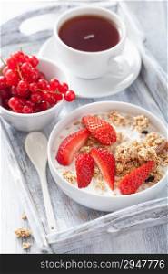 granola with strawberry for breakfast
