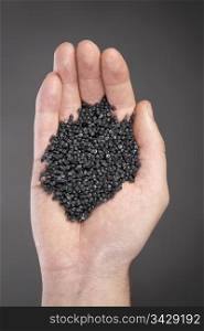 Granular recycled plastic made of car bumpers etc.