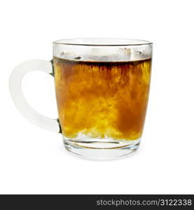 Granulated coffee in a glass mug with hot water isolated on white background