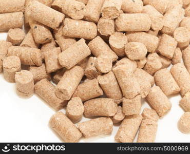 granules of Wheat Bran background. Food for horses and farm animal