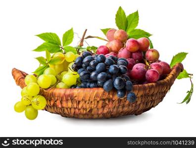 Grape in wicker basket isolated on a white background. Grape in wicker basket