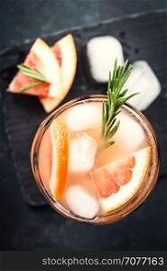 Grapefruit and rosemary gin cocktail or margarita, refreshing drink with ice