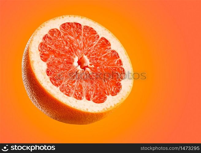 Grapefruit closeup isolated on orange background. Very detailed macro shoot with subject on left and copy space on right.. Grapefruit closeup isolated on orange background.