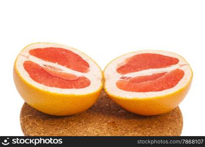 grapefruit slices on breadboard isolated