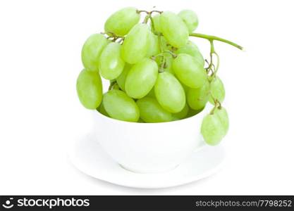 grapes in the cup is isolated on white