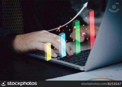 Graph and arrow virtual screen with computer laptop on desk. Business investment growth analysis chart increase revenue concept.