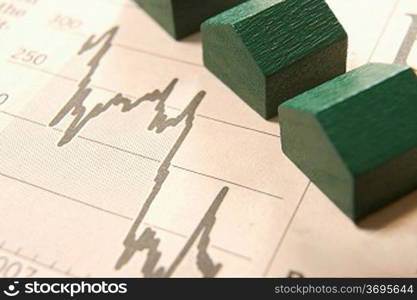 graph in a paper with wooden houses