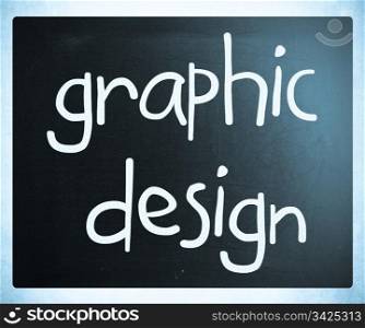 ""Graphic design" handwritten with white chalk on a blackboard"