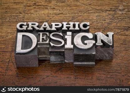 graphic design text in mixed vintage metal type printing blocks over grunge wood