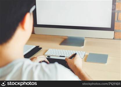 Graphic designer Brainstorming drawing on graphics tablet at workplace