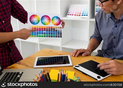 Graphic designers present colors from the color palette to their friends, for creative design ideas, creative designs of graphic designers.