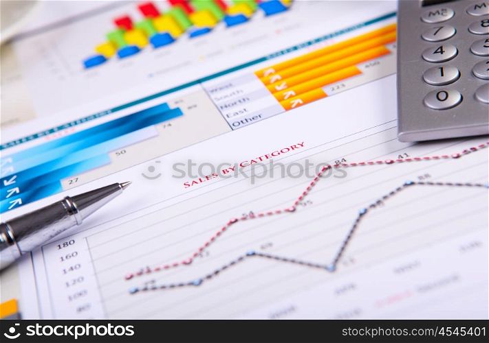 Graphs, charts, business table. The workplace of business people.