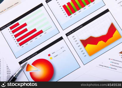 Graphs, charts, business table. The workplace of business people.