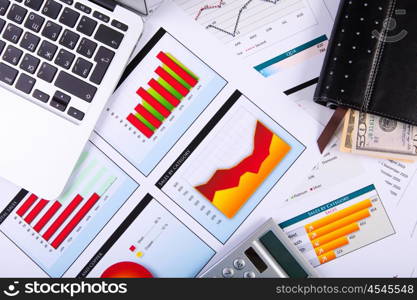 Graphs, charts, business table. The workplace of business people.