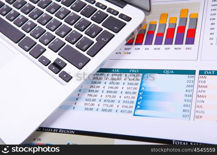 Graphs, charts, business table. The workplace of business people.