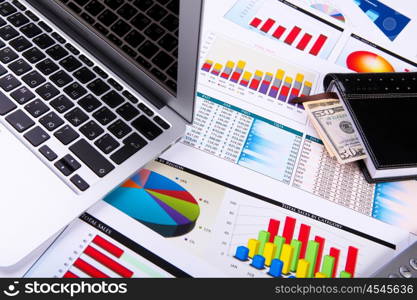 Graphs, charts, business table. The workplace of business people.