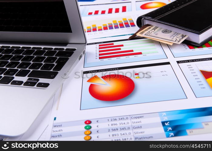 Graphs, charts, business table. The workplace of business people.