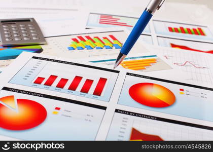 Graphs, charts, business table. The workplace of business people.