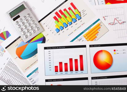 Graphs, charts, business table. The workplace of business people.