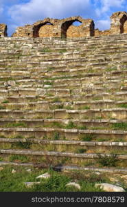 Grass and rows on seats in old stadium in Aphrodisias, Turkey